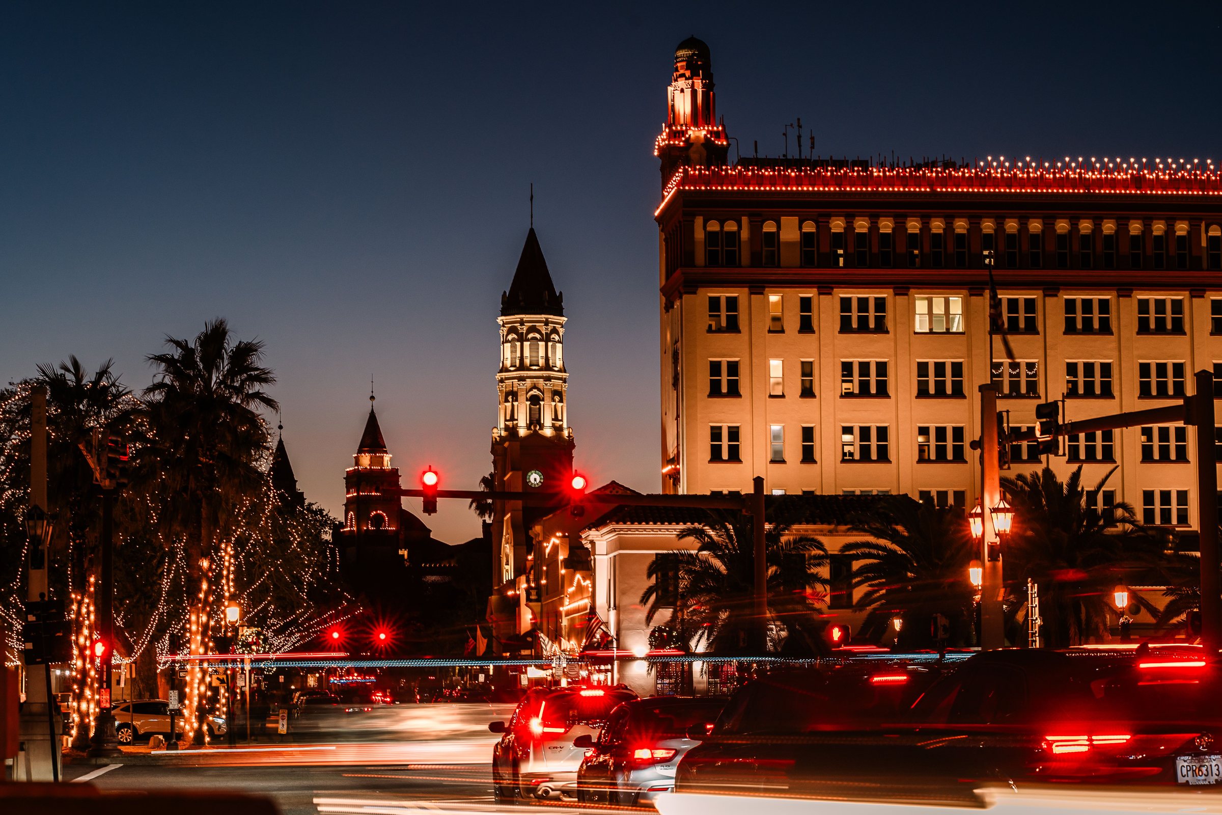 St. Augustine architecture lit with festive lights during twilight