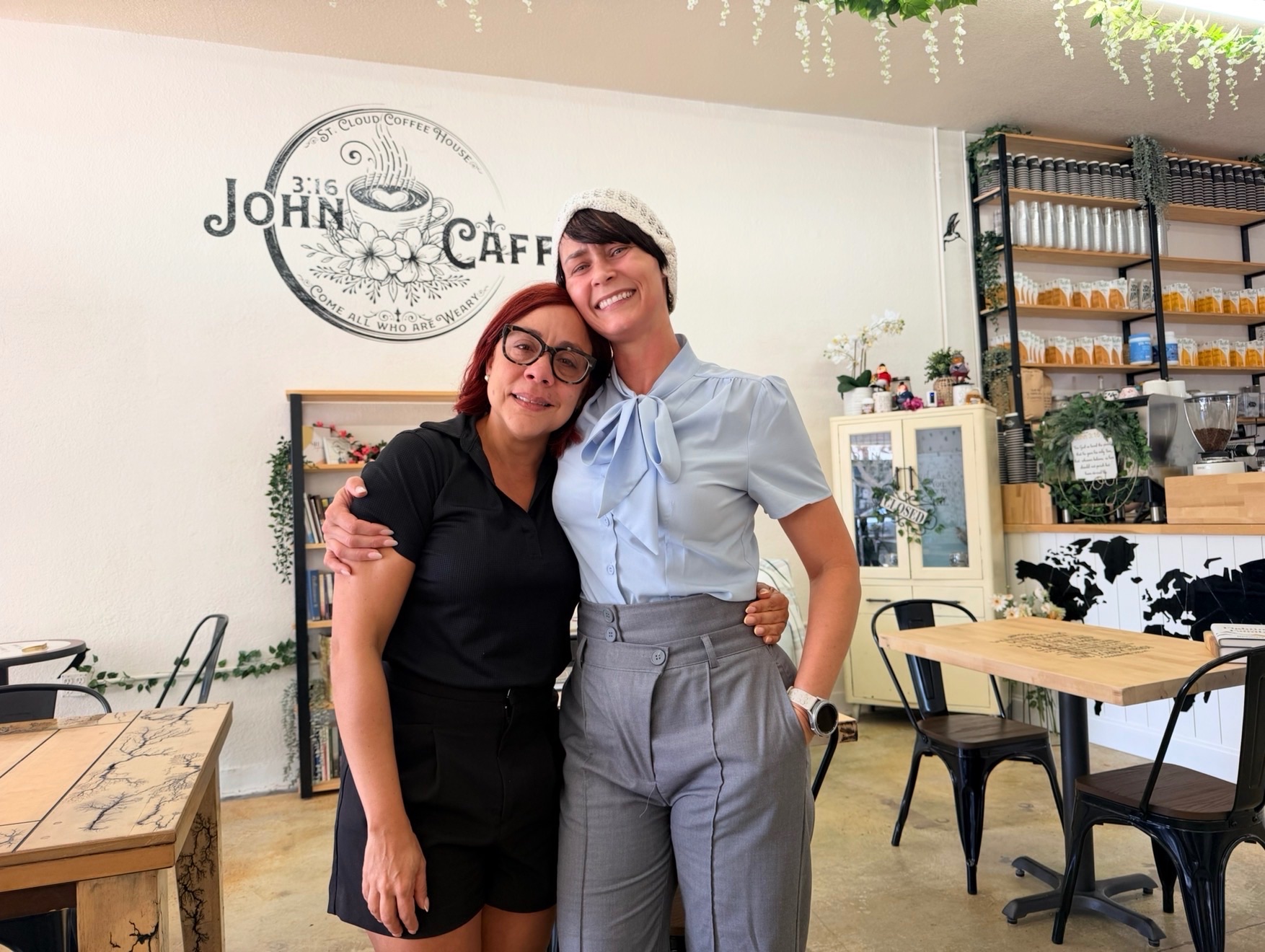 Christy and a Yomari smiling together inside John 3:16 Caffe