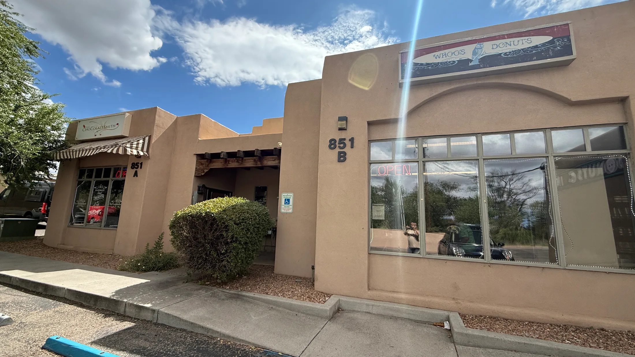 The Whoo's Donuts and ChocolateSmith storefronts side by side at 851B and 851A Cerrillos Road