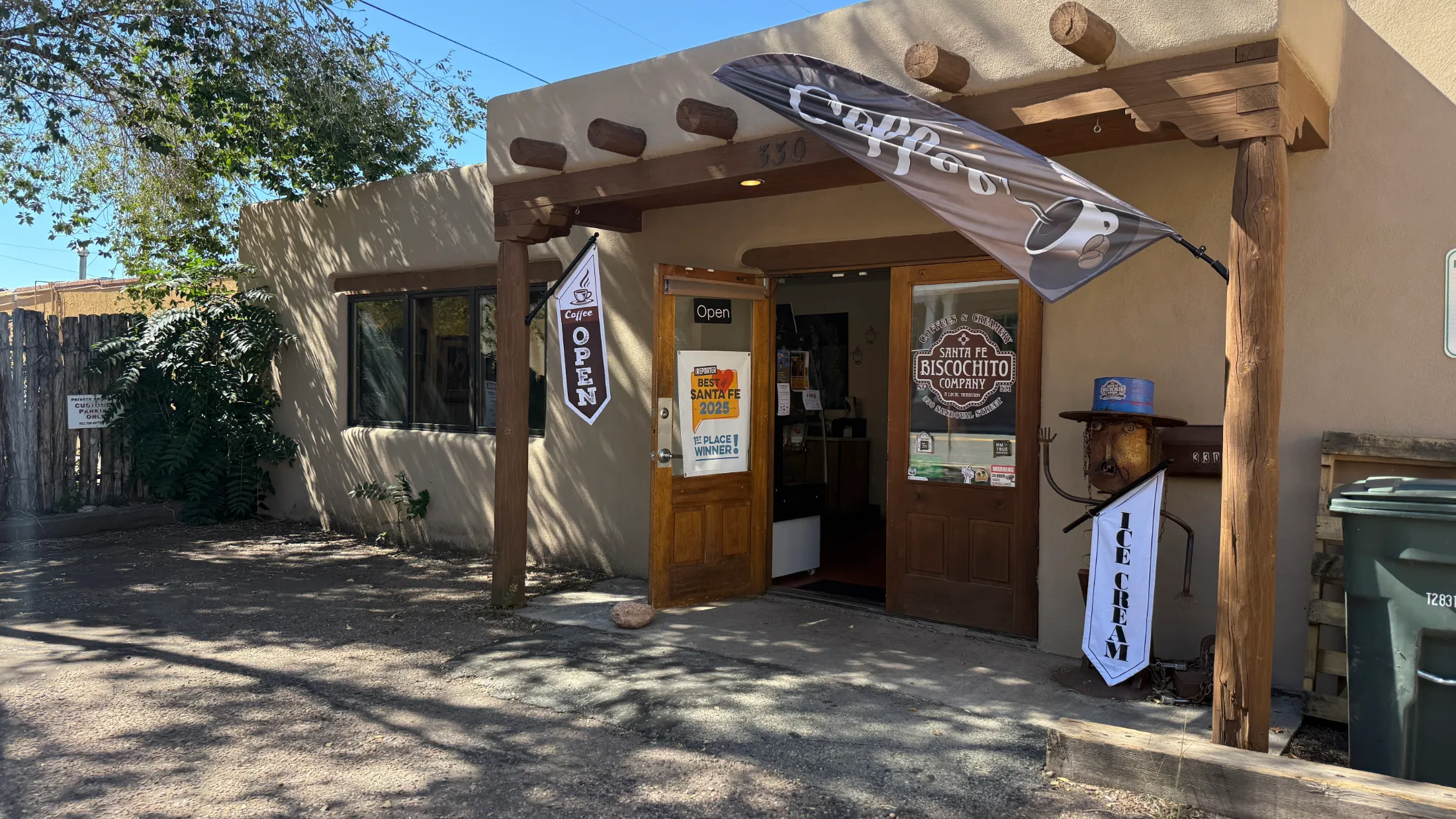 Exterior of Santa Fe Biscochito Company at 330 Sandoval Street, with a Best of Santa Fe 2025 first-place winner placard on the door