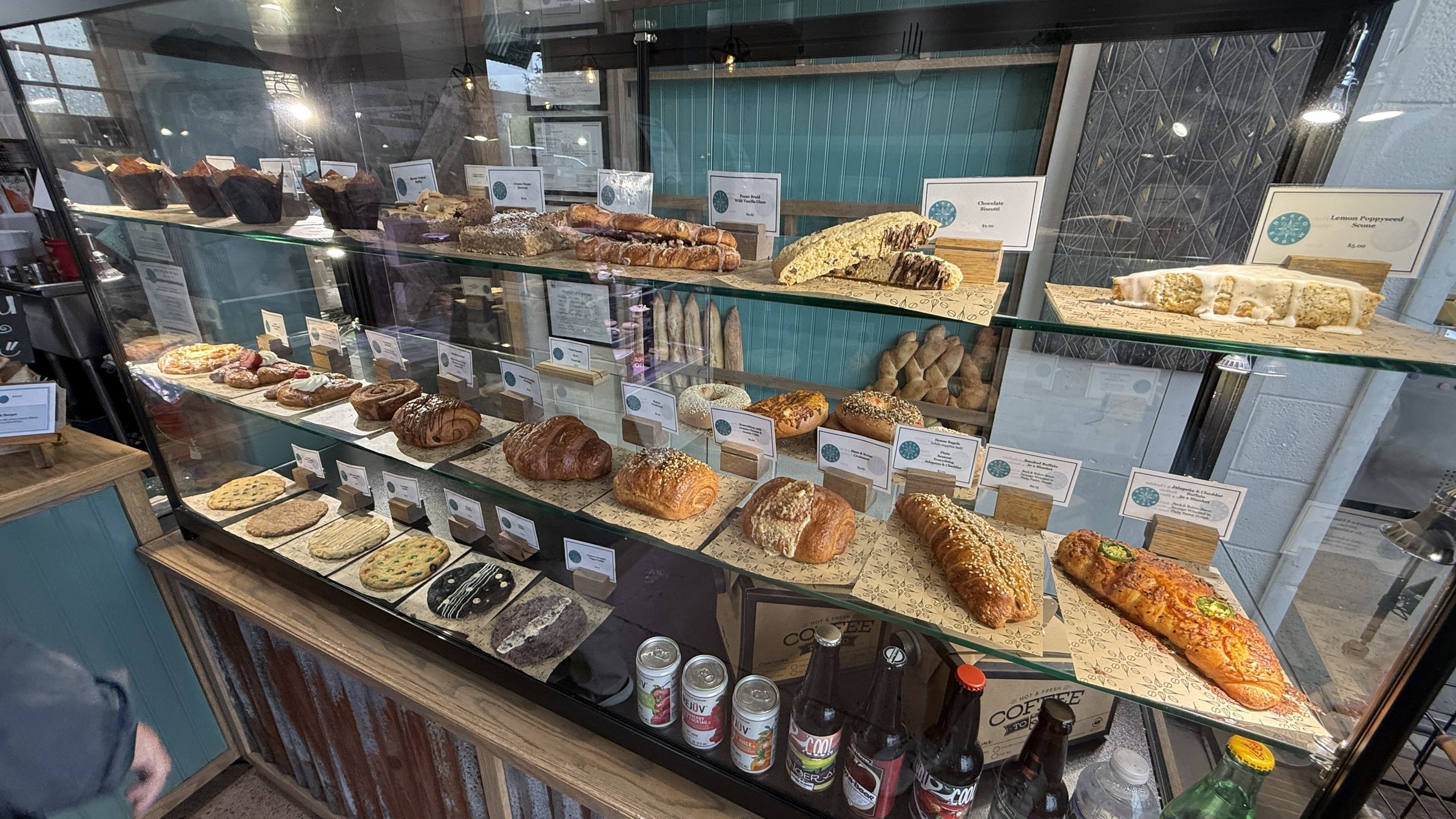Close view of the pastry case at Baked and Brew