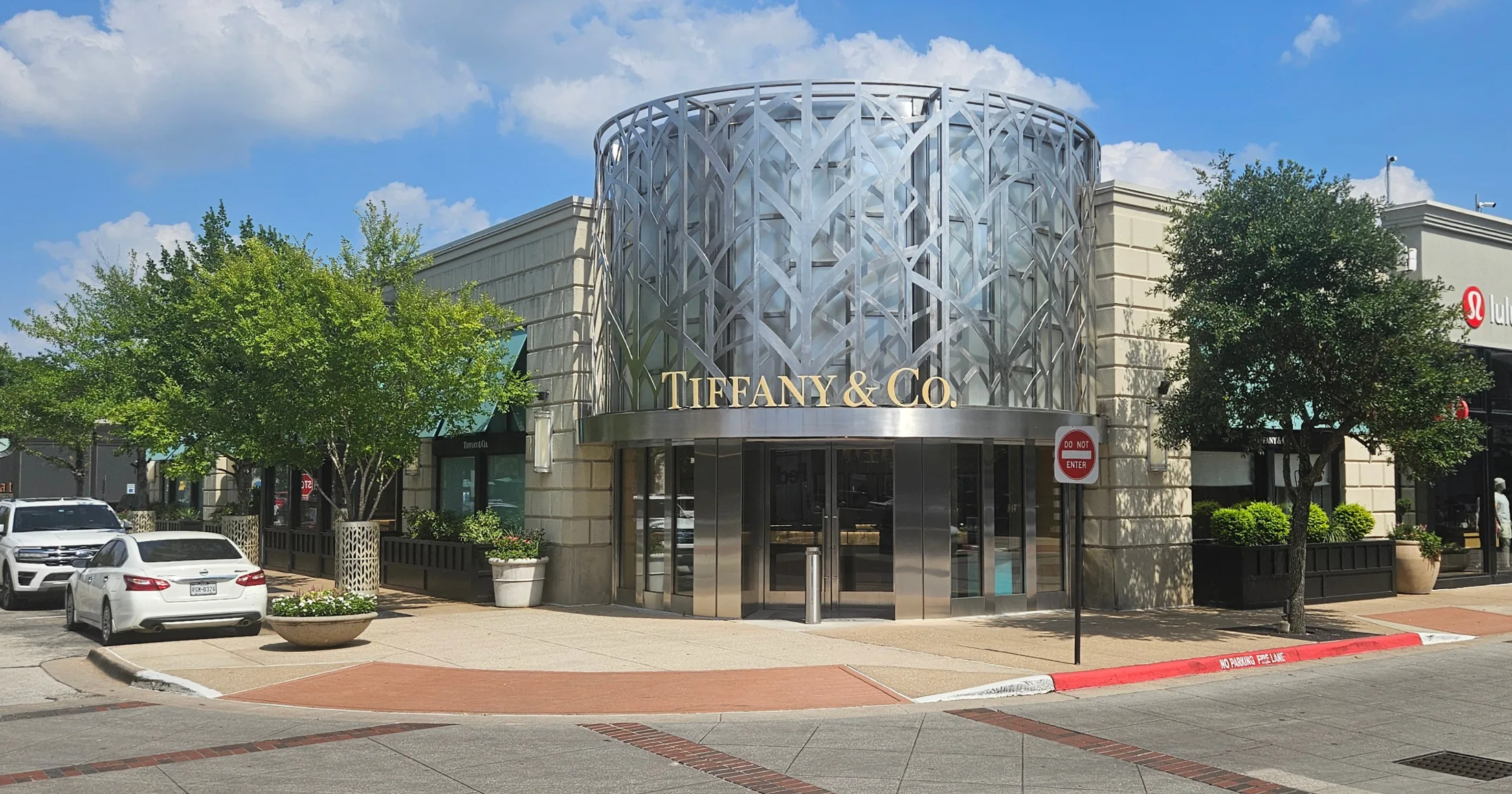 Tiffany and Co. storefront at Market Street with its signature cylindrical metalwork facade and Lululemon visible to the right