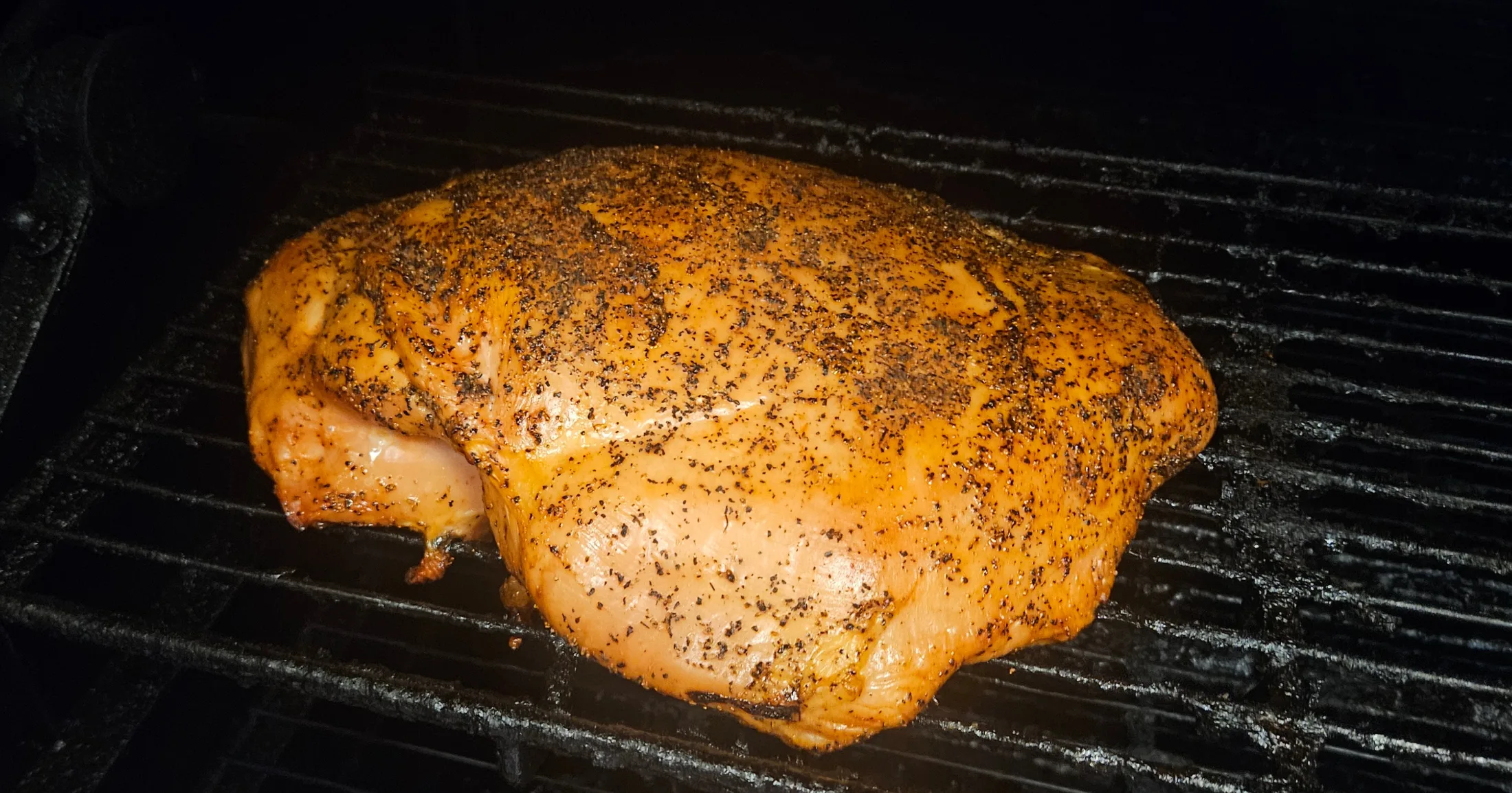 Seasoned Turkey smoking on the pit at Pit Master Bar-B-Que