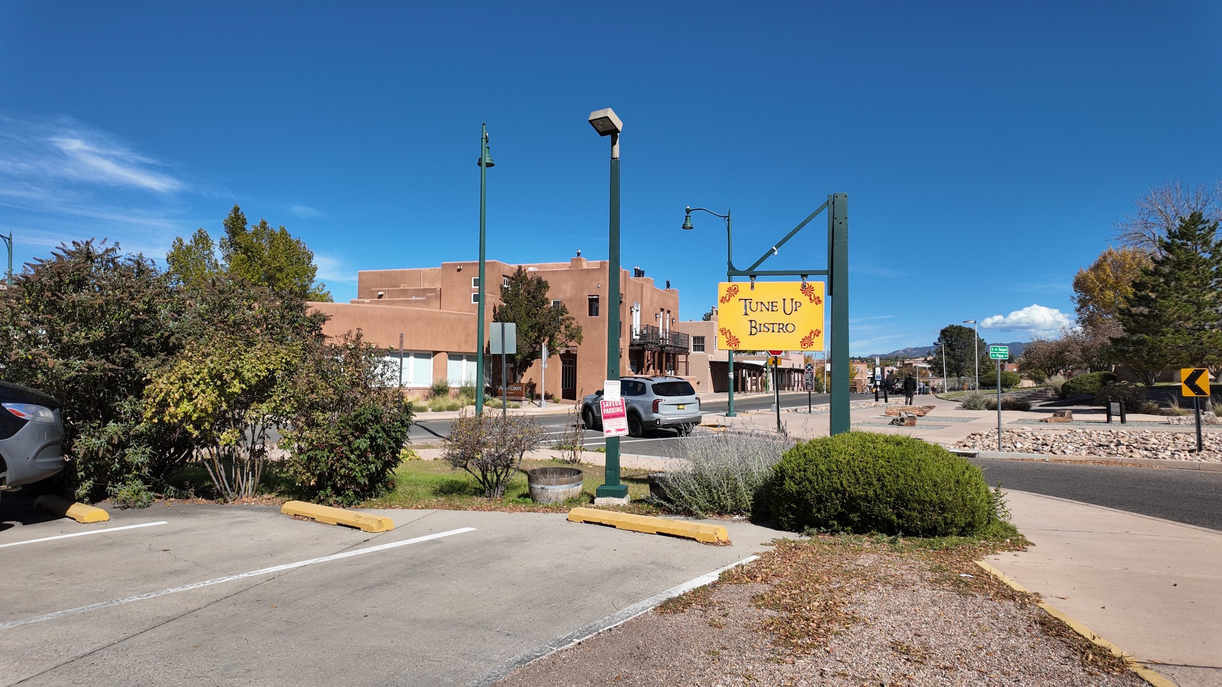 The Tune Up Bistro sign at the street corner