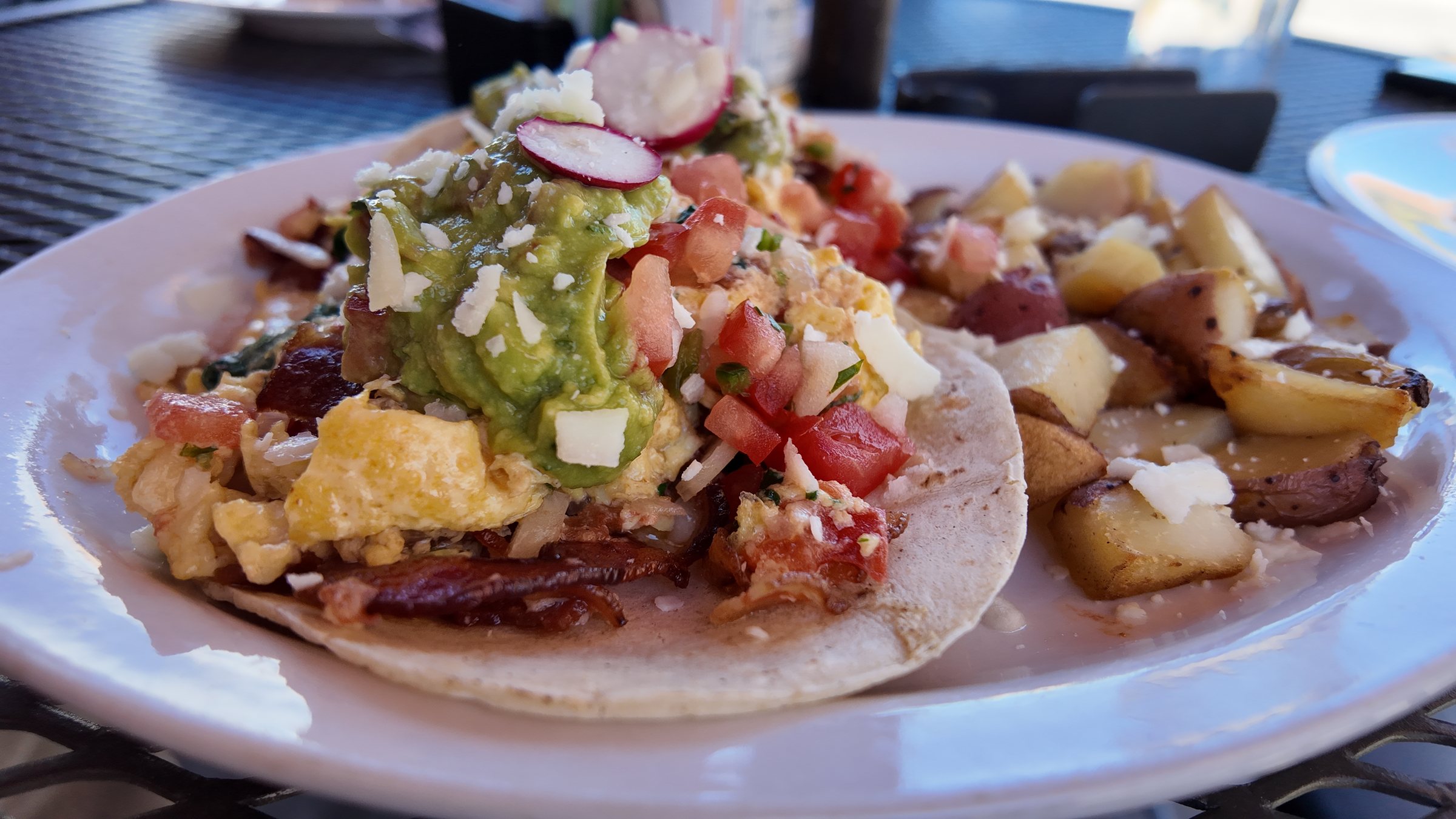 Breakfast tacos with home fries at Tune Up Bistro