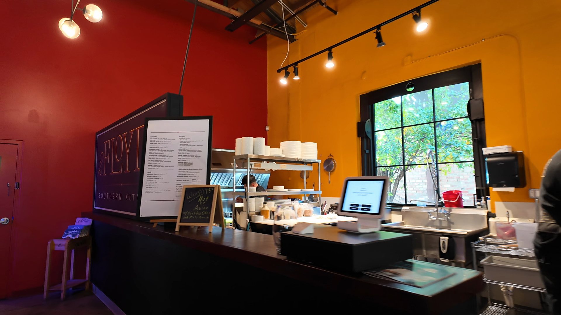 The 2 Floyd's Southern Kitchen counter inside CHOMP.